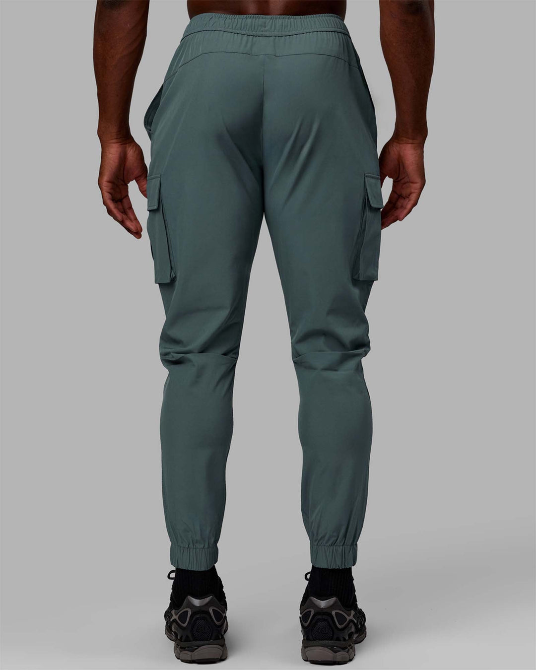 Man wearing Energy Stretch Performance Cargo Joggers - Storm