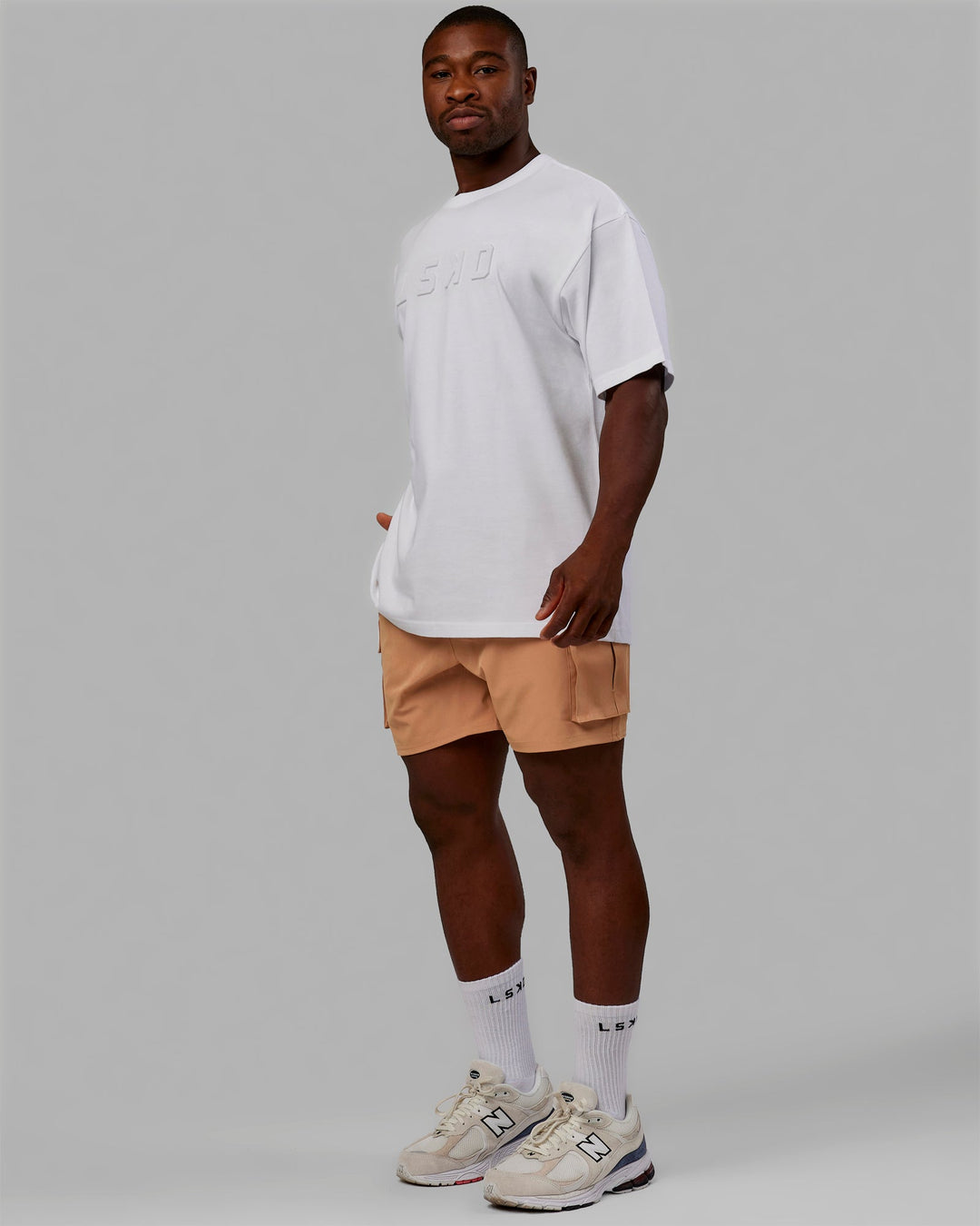 Man wearing Energy Stretch Performance Cargo Short - Latte