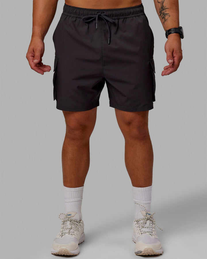 Man wearing Energy Stretch Performance Cargo Short - Pirate Black