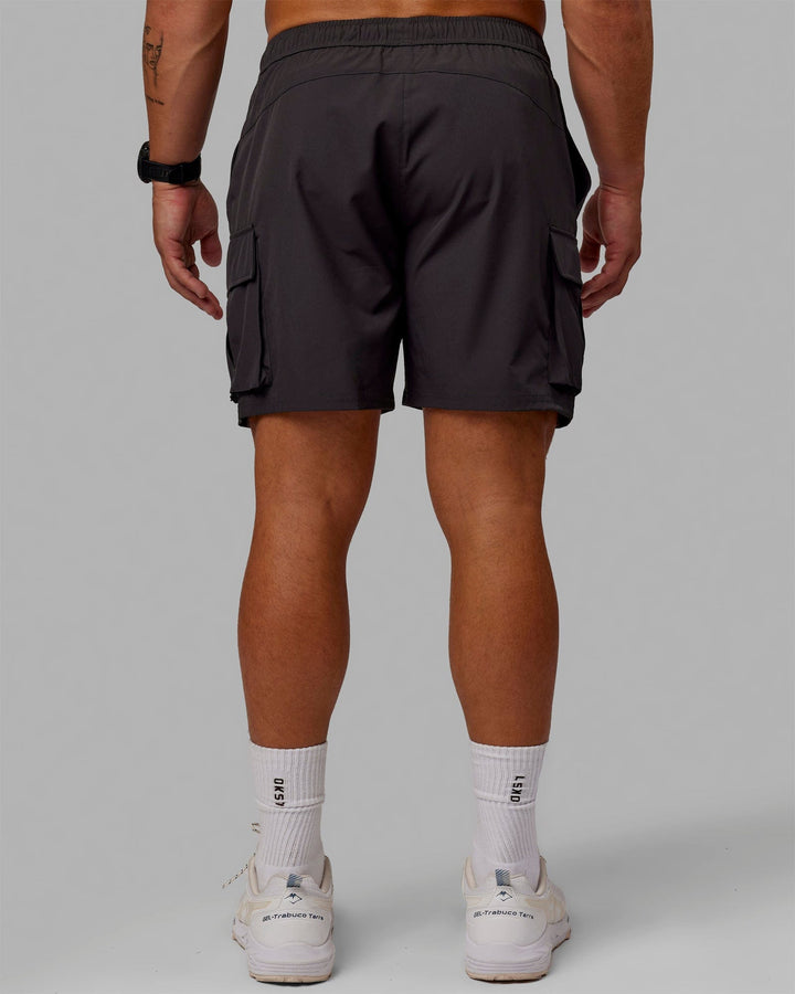 Man wearing Energy Stretch Performance Cargo Short - Pirate Black