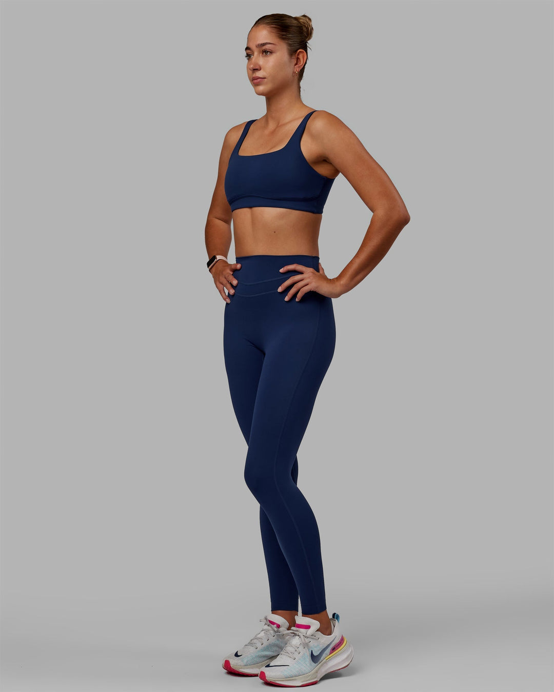 Woman wearing Enhance Full Length Leggings - Midnight Blue