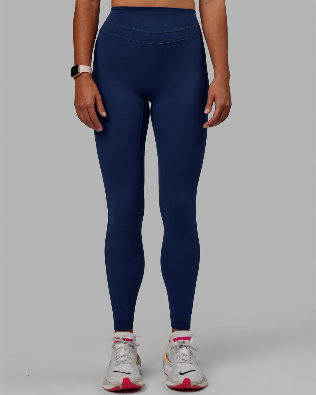 Woman wearing Enhance Full Length Leggings - Midnight Blue