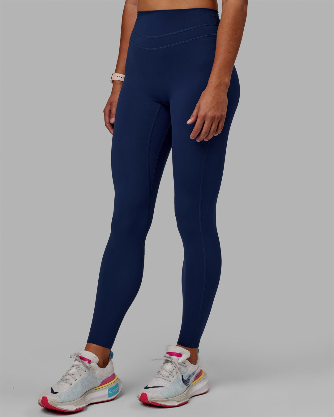 Woman wearing Enhance Full Length Leggings - Midnight Blue