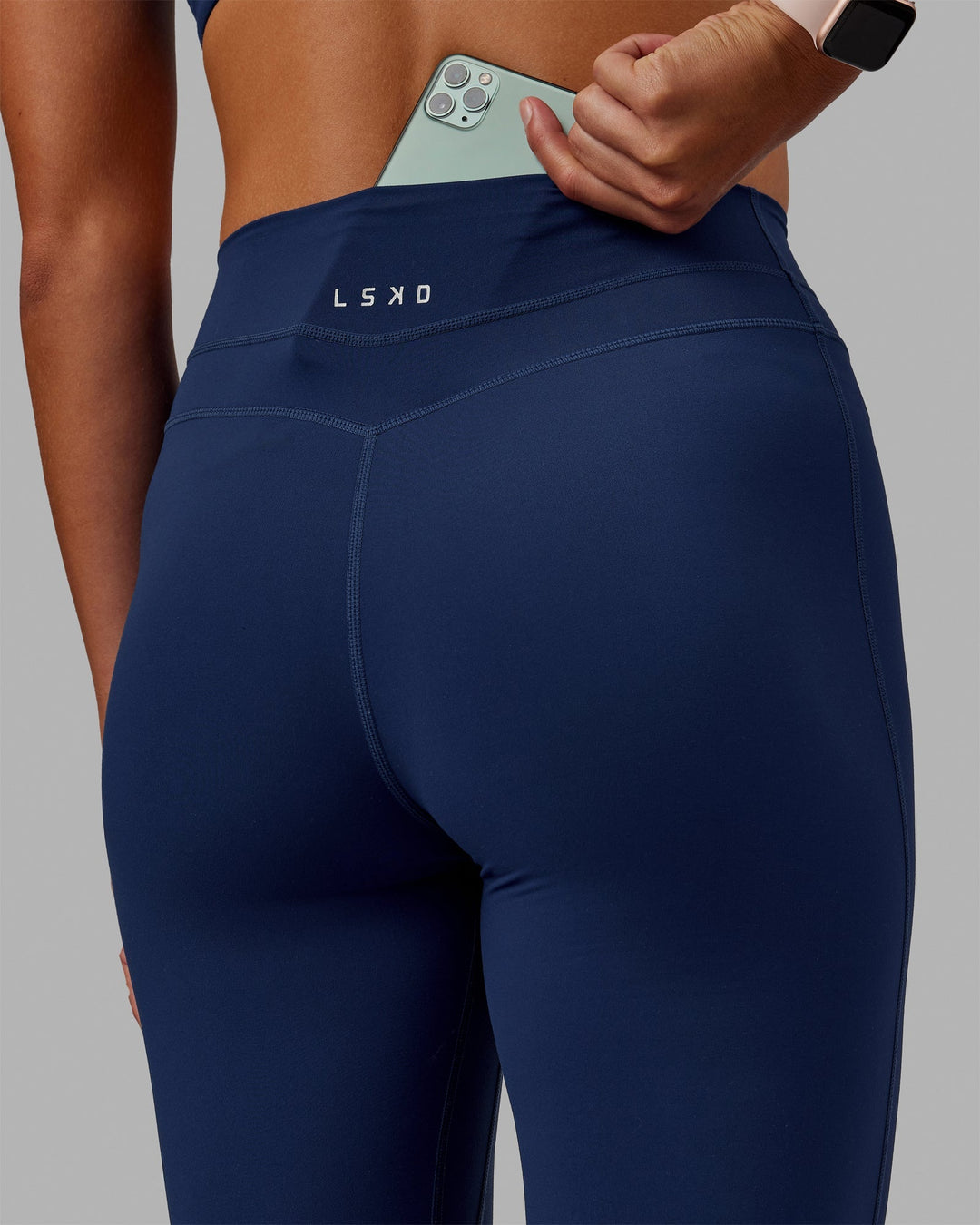 Woman wearing Enhance Full Length Leggings - Midnight Blue