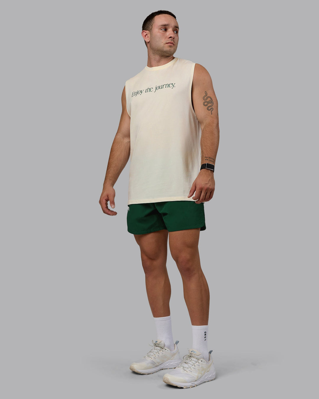 Man wearing Enjoy The Journey 5&quot; Shorts - Deep Emerald-Off White