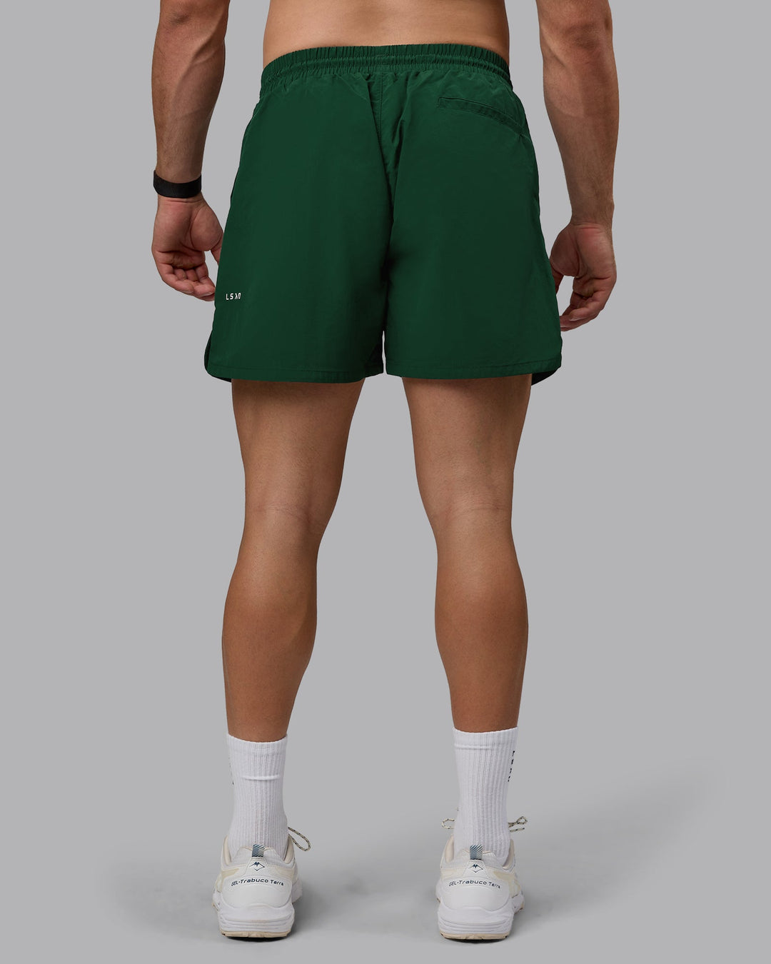 Man wearing Enjoy The Journey 5&quot; Shorts - Deep Emerald-Off White