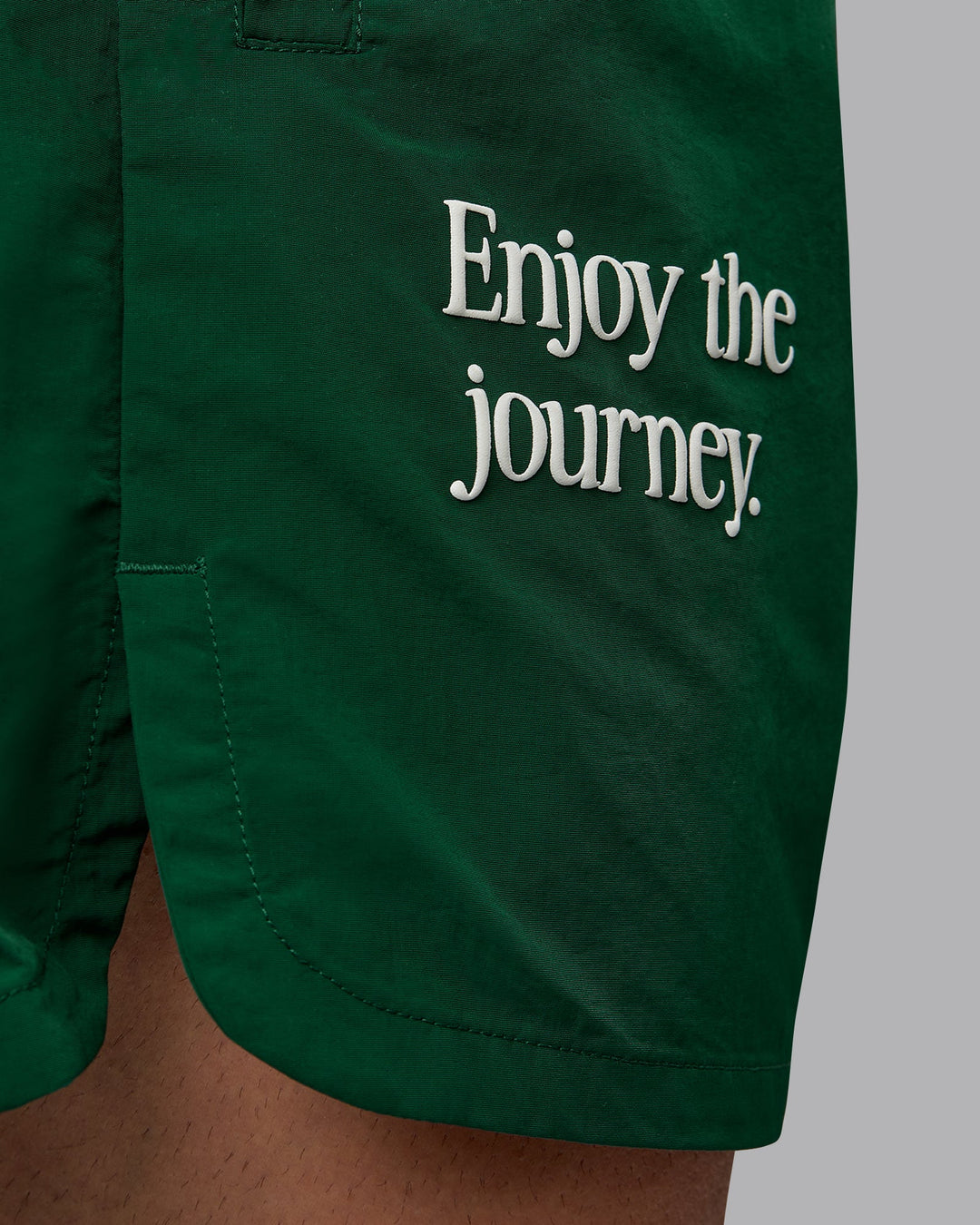 Man wearing Enjoy The Journey 5&quot; Shorts - Deep Emerald-Off White