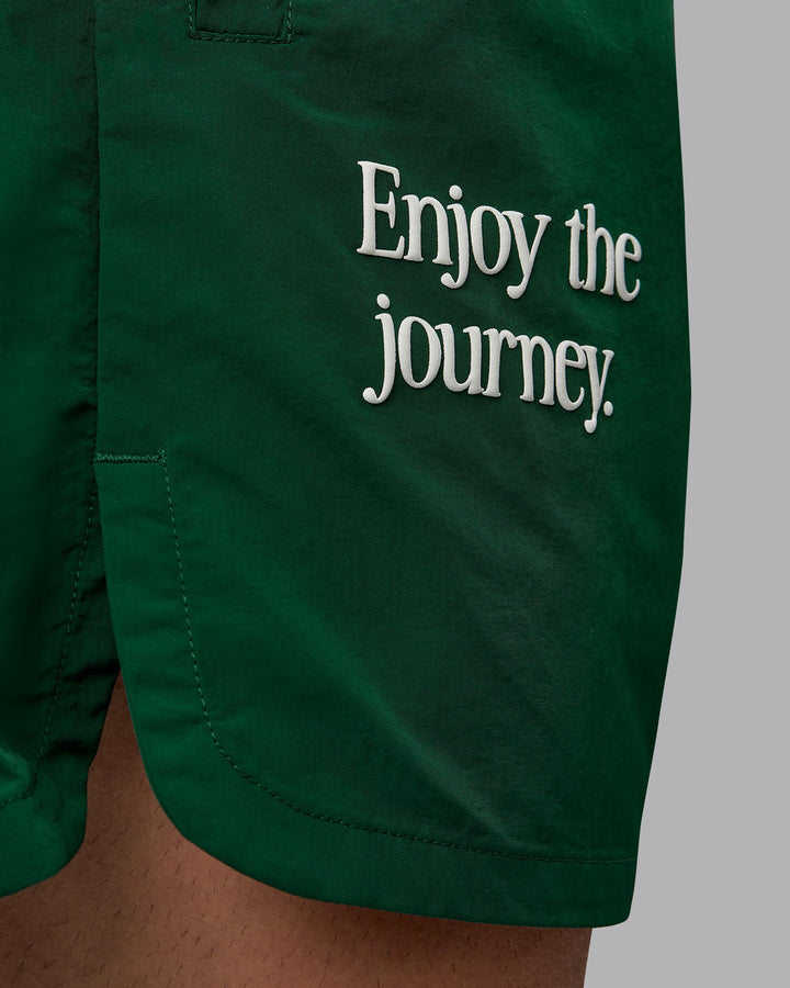 Man wearing Enjoy The Journey 5&quot; Shorts - Deep Emerald-Off White
