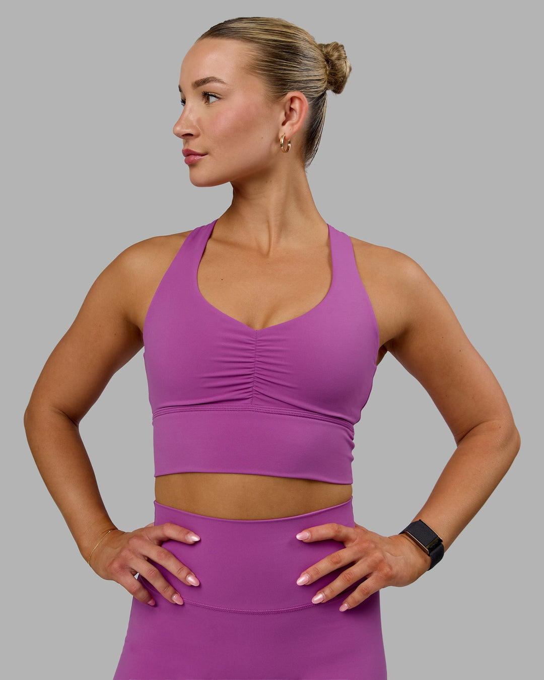 Woman wearing Evoke Sports Bra - Orchid