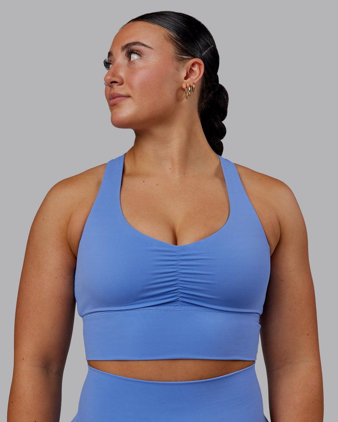 Woman wearing Evoke Sports Bra - Ultramarine