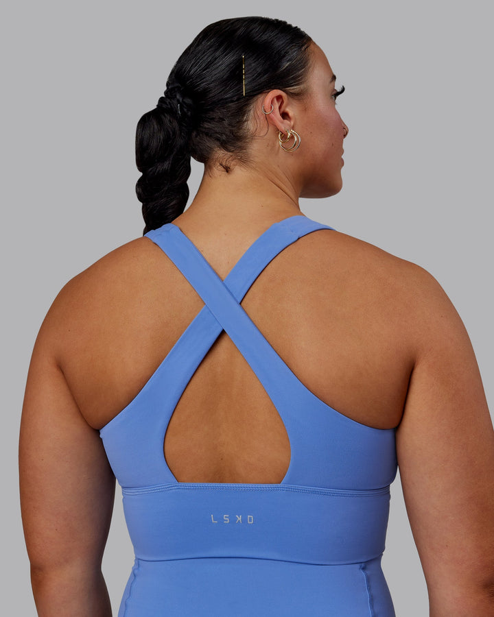 Woman wearing Evoke Sports Bra - Ultramarine
