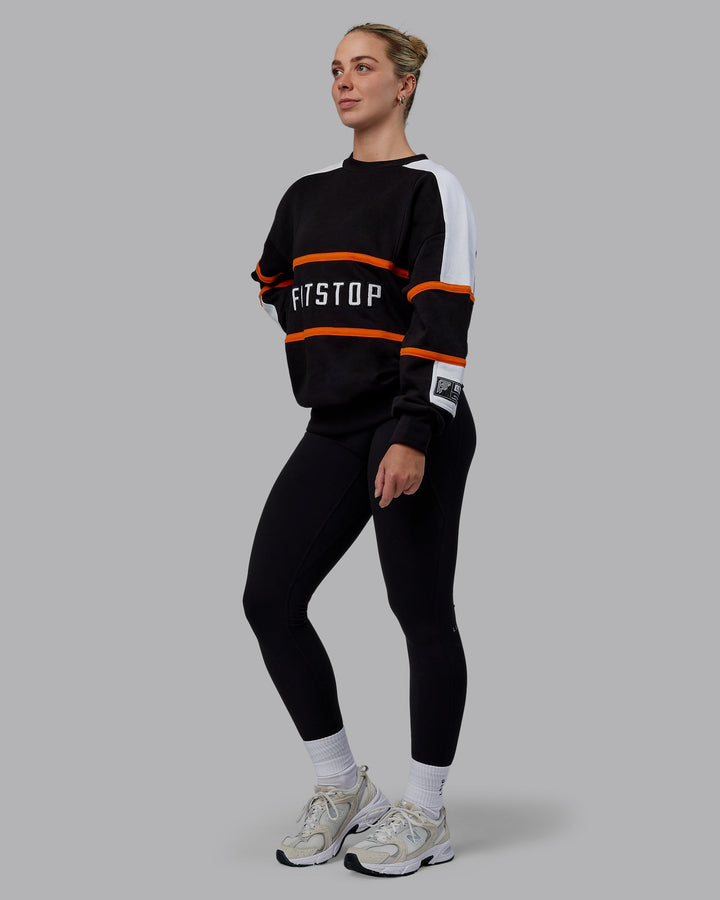 Woman wearing Unisex Fitstop Move More Sweater Oversize - Black-White
