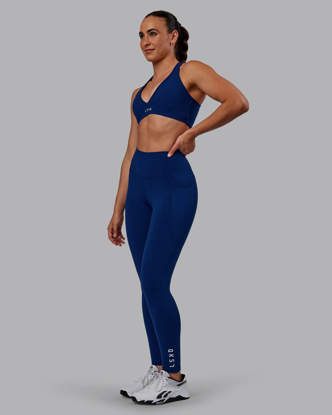 Woman wearing Flux Ultra High-Rise Full Length Legging Pockets - Midnight Blue