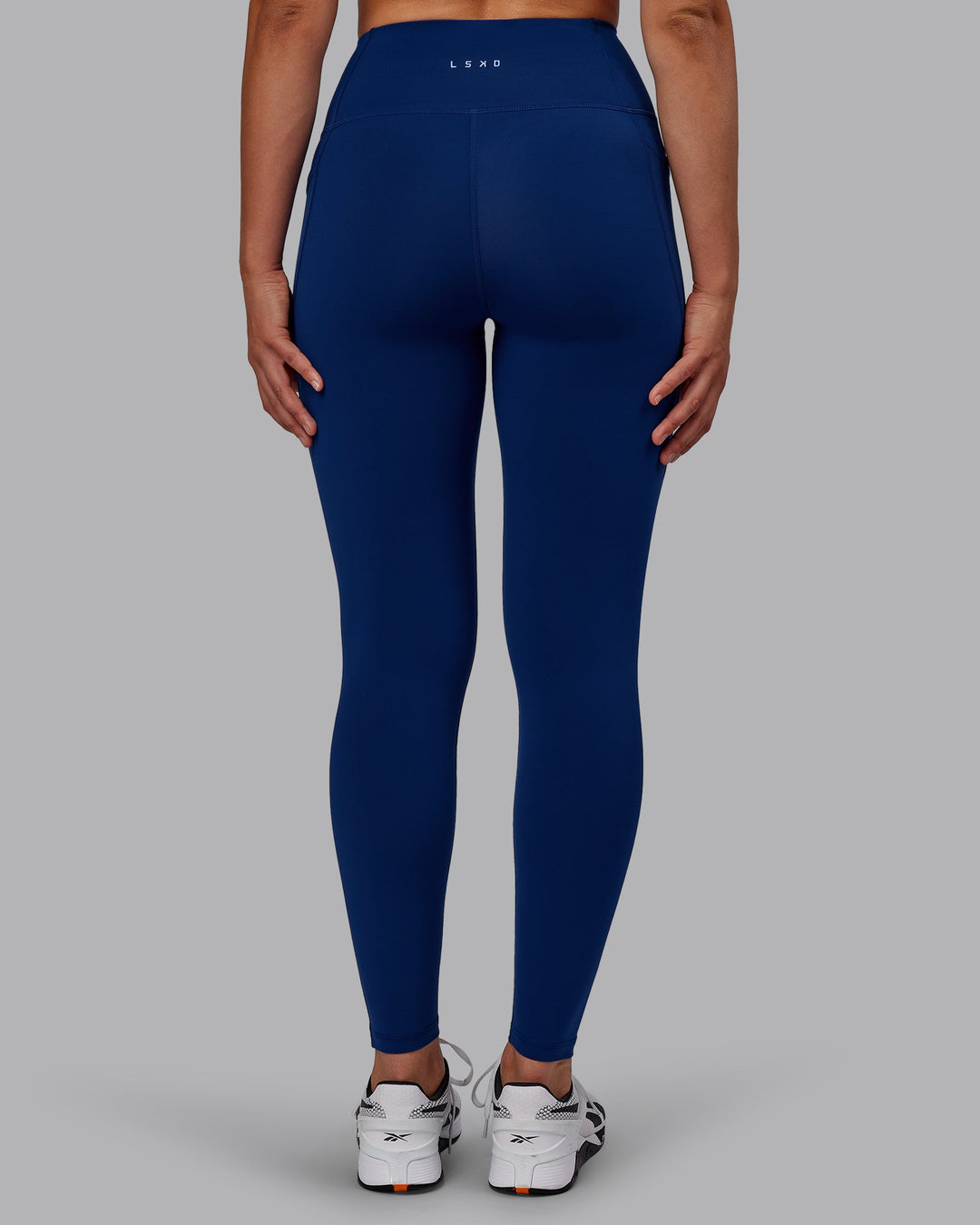 Woman wearing Flux Full Length Leggings - Midnight Blue