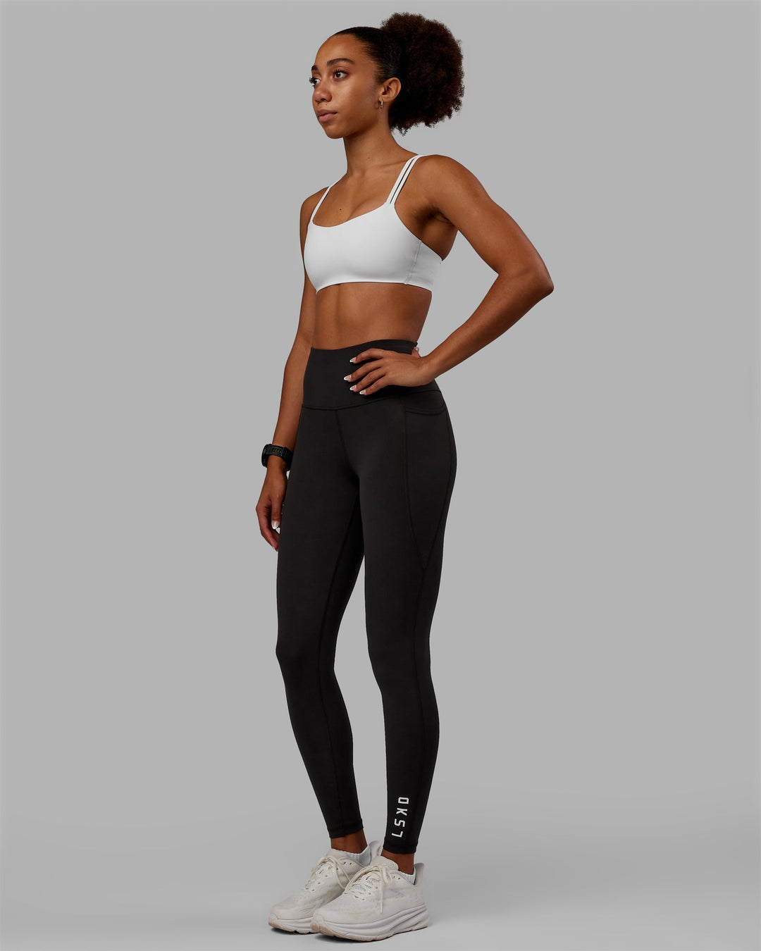 Woman wearing Flux Full Length Leggings - Pirate Black