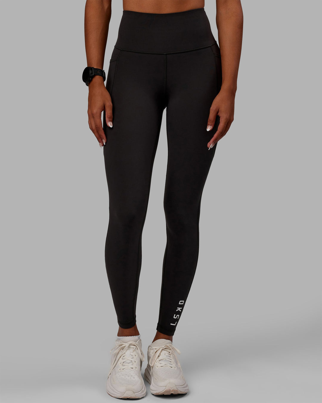 Woman wearing Flux Full Length Leggings - Pirate Black