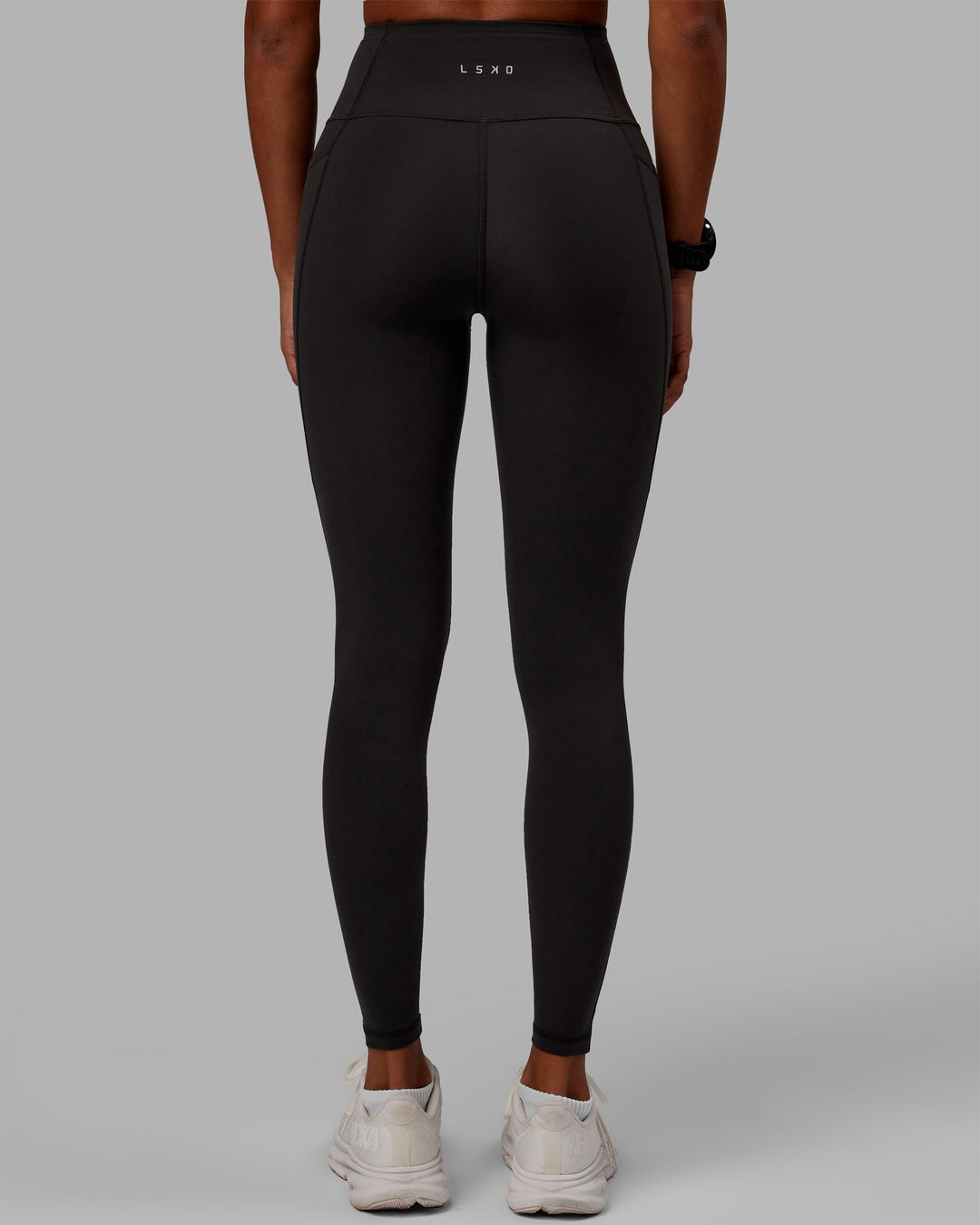 Woman wearing Flux Full Length Leggings - Pirate Black