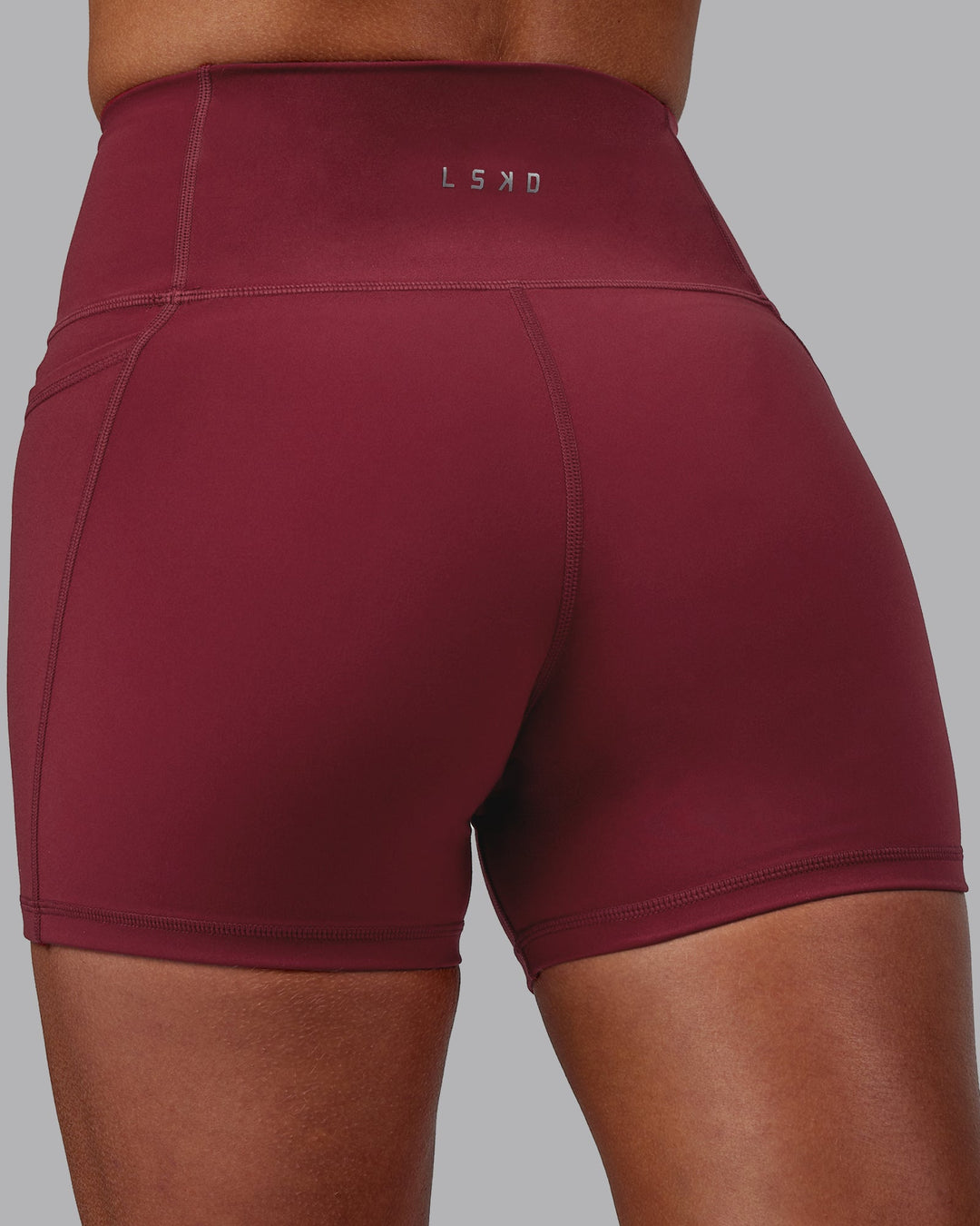 Women Wearing Flux Ultra High-Rise 4" Short Pockets - Cranberry