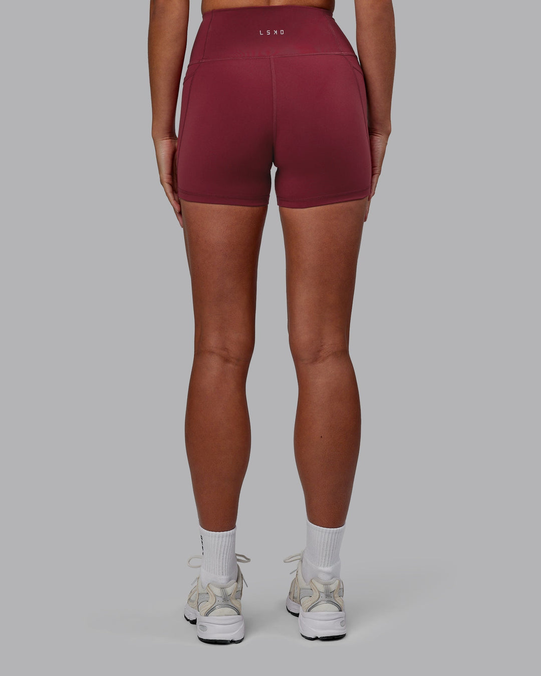 Women Wearing Flux Ultra High-Rise 4" Short Pockets - Cranberry