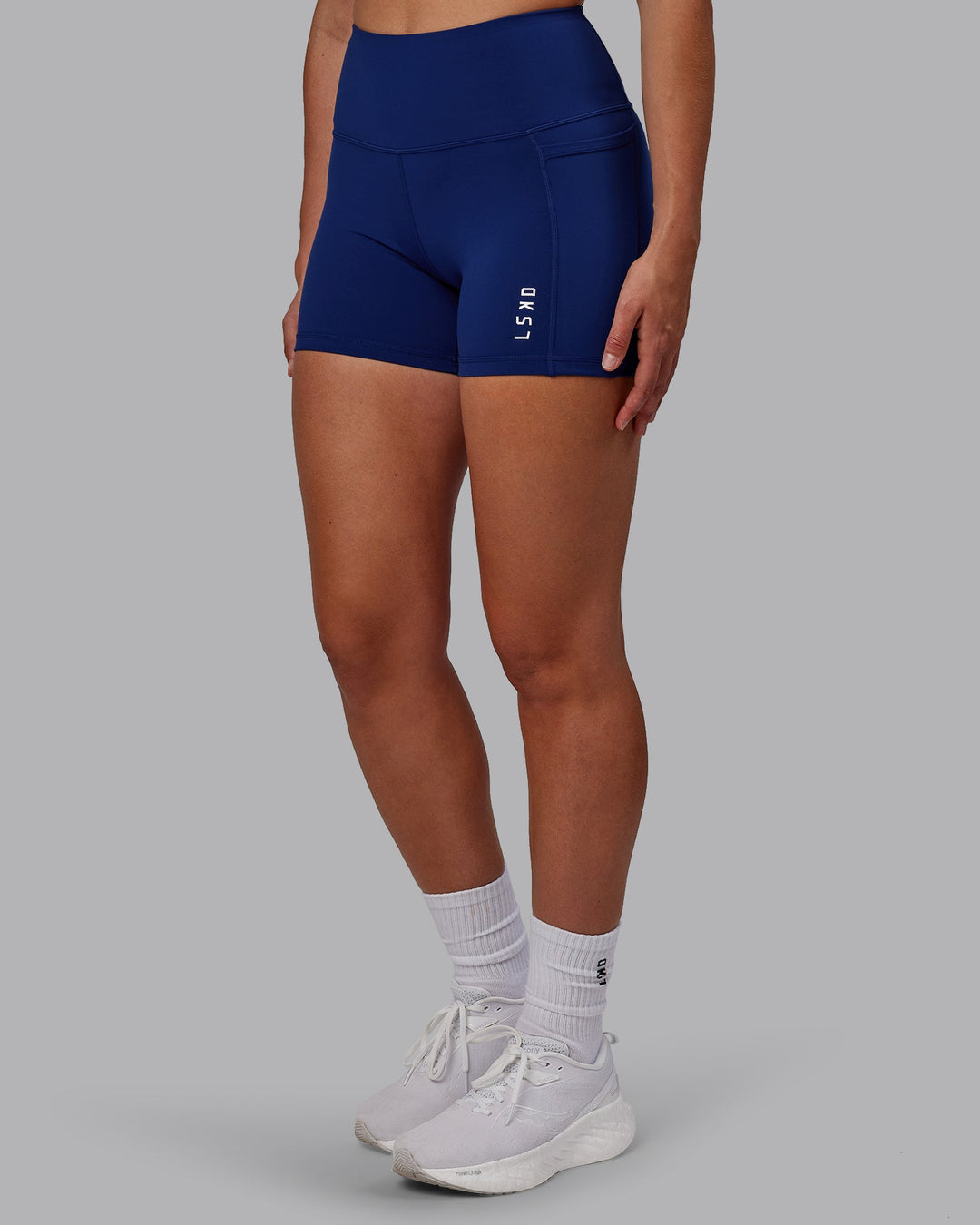 Woman wearing Flux X-Length Shorts - Midnight Blue