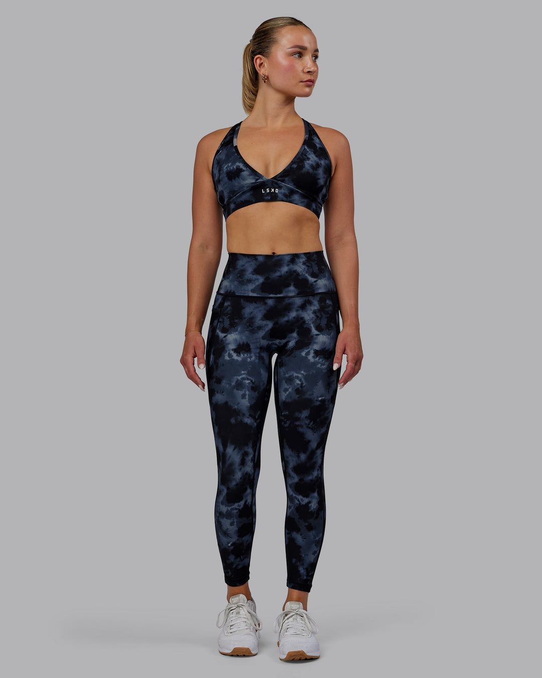 Woman wearing Form Sports Bra - Tie Dye-Midnight