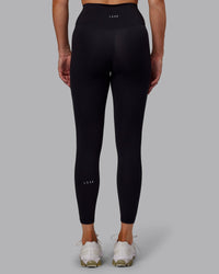 Woman wearing Fusion Ultra High-Rise 7/8 Legging - Black | Model:Hannah | Size:S