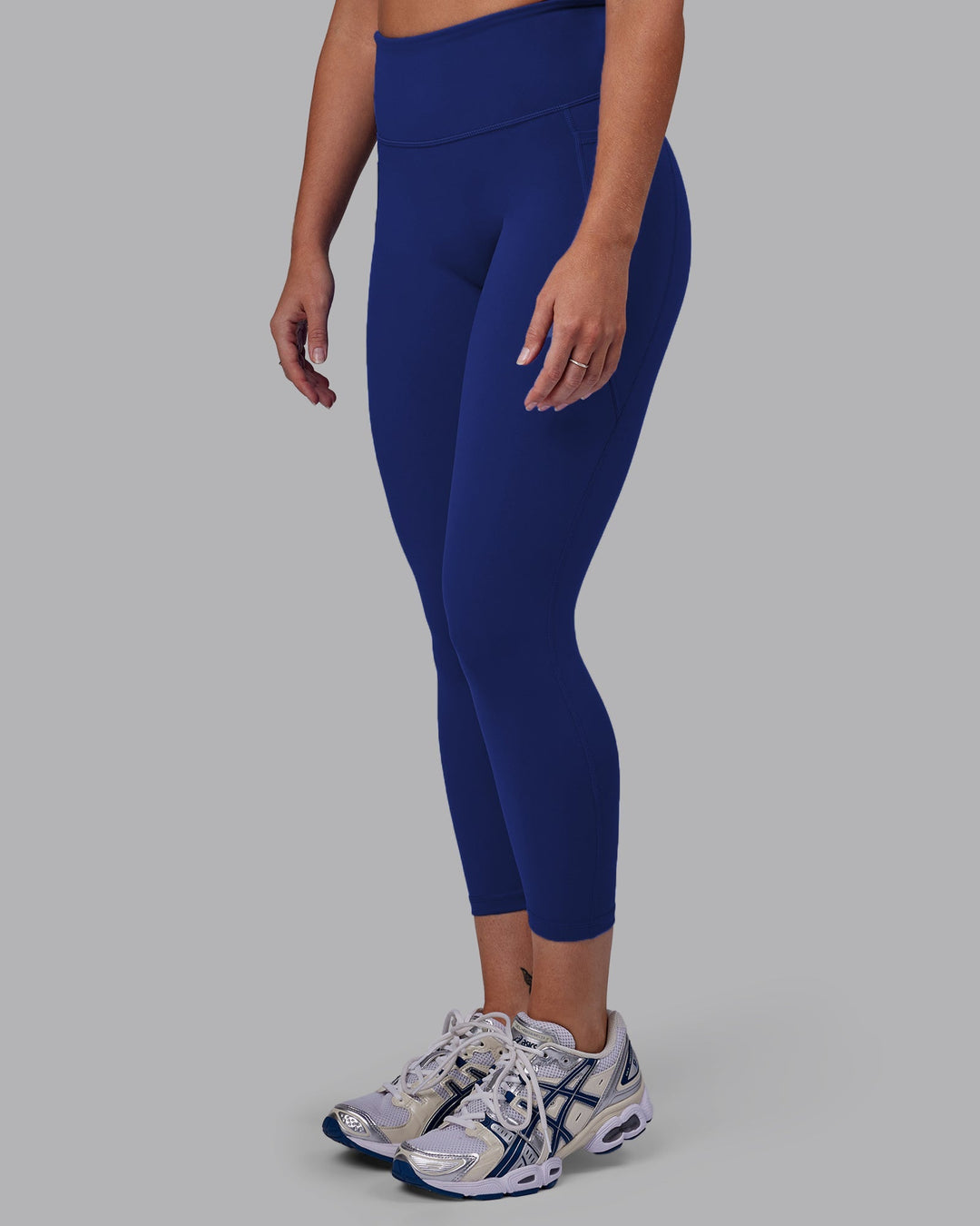 Woman wearing Fusion 7/8 Length Leggings - Midnight Blue