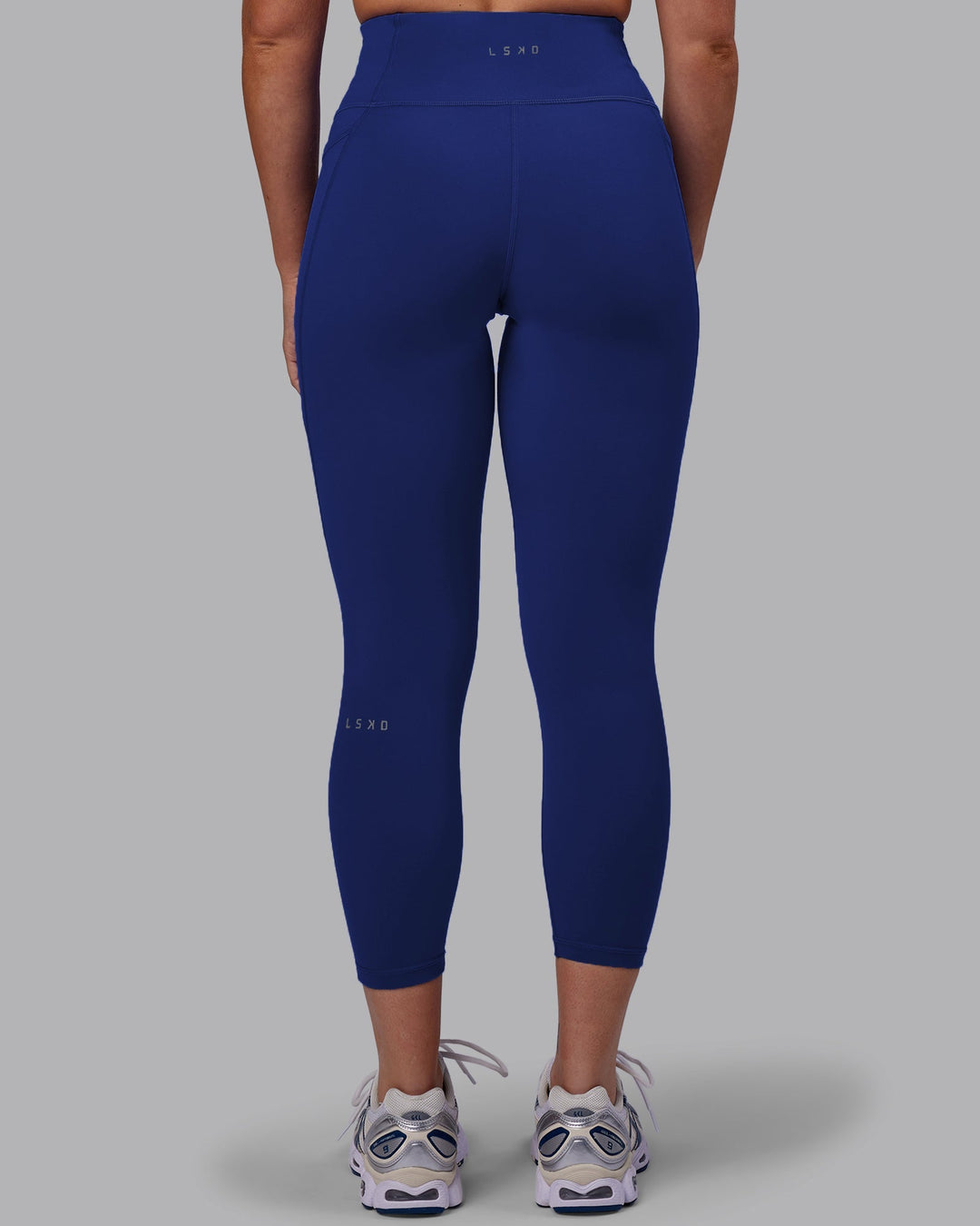 Woman wearing Fusion 7/8 Length Leggings - Midnight Blue