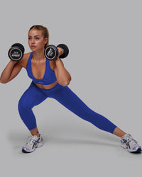 Woman wearing Fusion Ultra High-Rise 7/8 Legging Pockets - Power Cobalt | Model:Hannah | Size:S