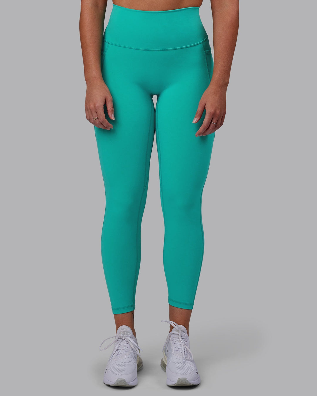 Woman wearing Fusion 7/8 Length Leggings - Turquoise Tide