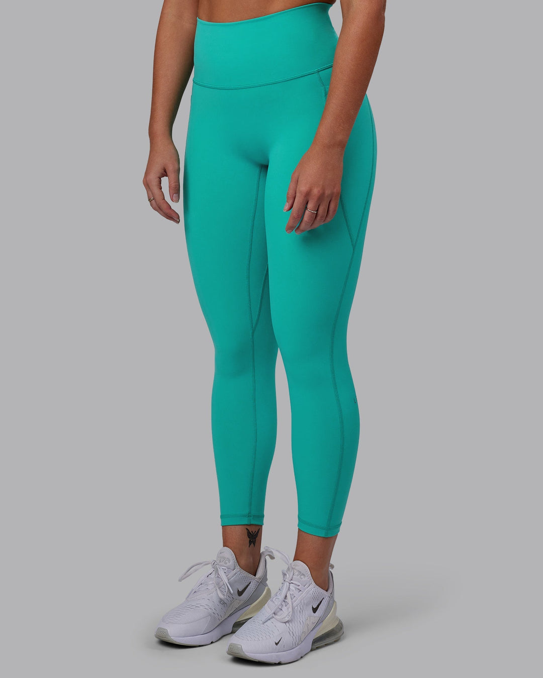 Woman wearing Fusion 7/8 Length Leggings - Turquoise Tide