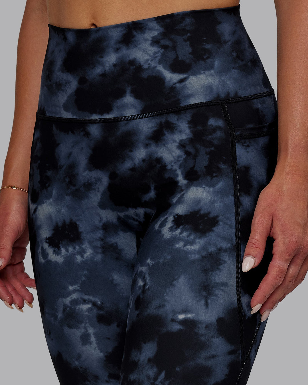 Woman wearing Fusion 7/8 Length Leggings - Tie Dye-Midnight