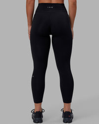 Woman wearing O.G. Fusion Ultra High-Rise 7/8 Legging Pockets - Black | Model:Annabelle | Size:S