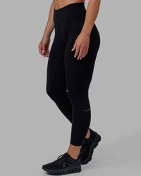 Woman wearing O.G. Fusion Ultra High-Rise 7/8 Legging Pockets - Black | Model:Annabelle | Size:S