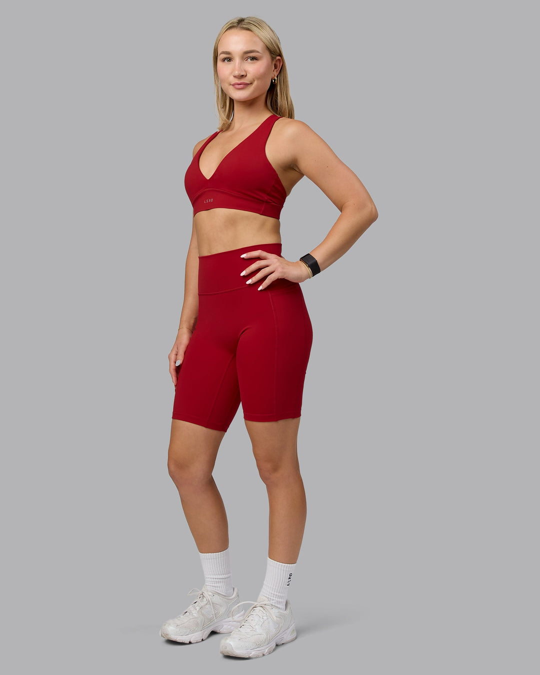 Woman wearing Fusion Bike Shorts with Pockets - Cherry Red