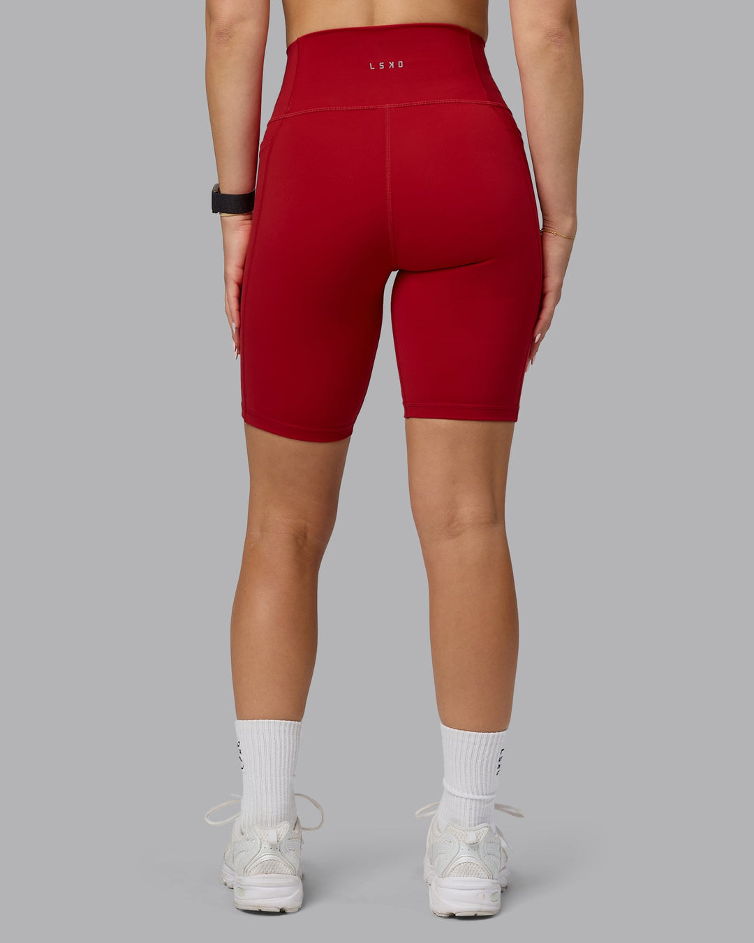 Woman wearing Fusion Bike Shorts with Pockets - Cherry Red