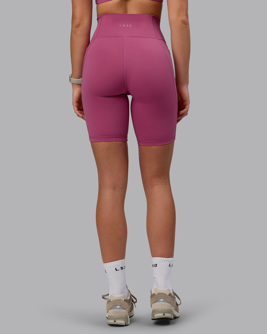 Woman wearing Fusion Bike Shorts with Pockets - Mauve Haze