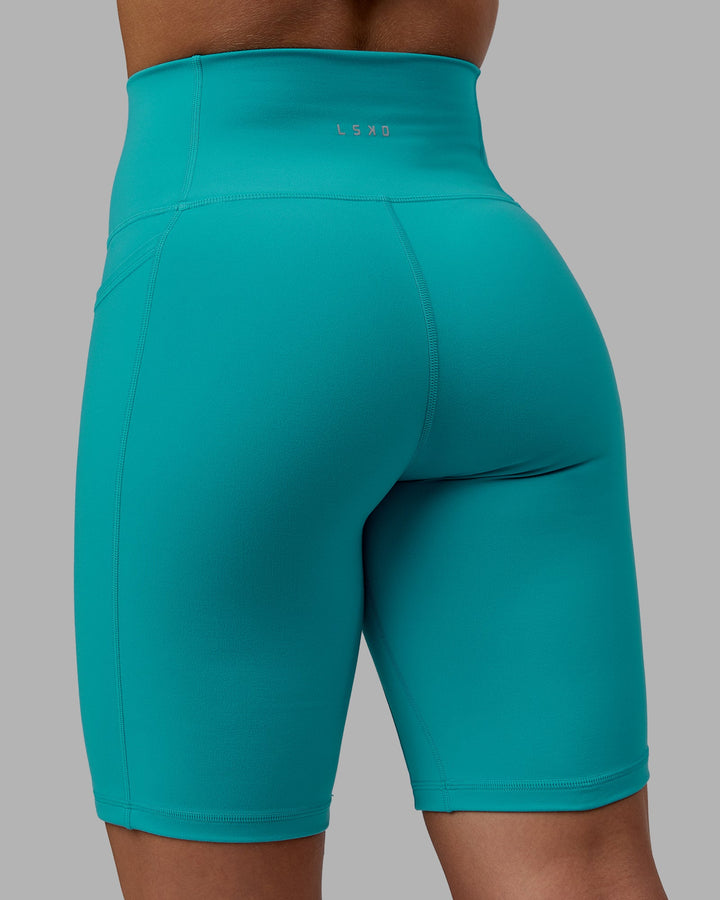 Woman wearing Fusion Bike Shorts - Uplift Blue
