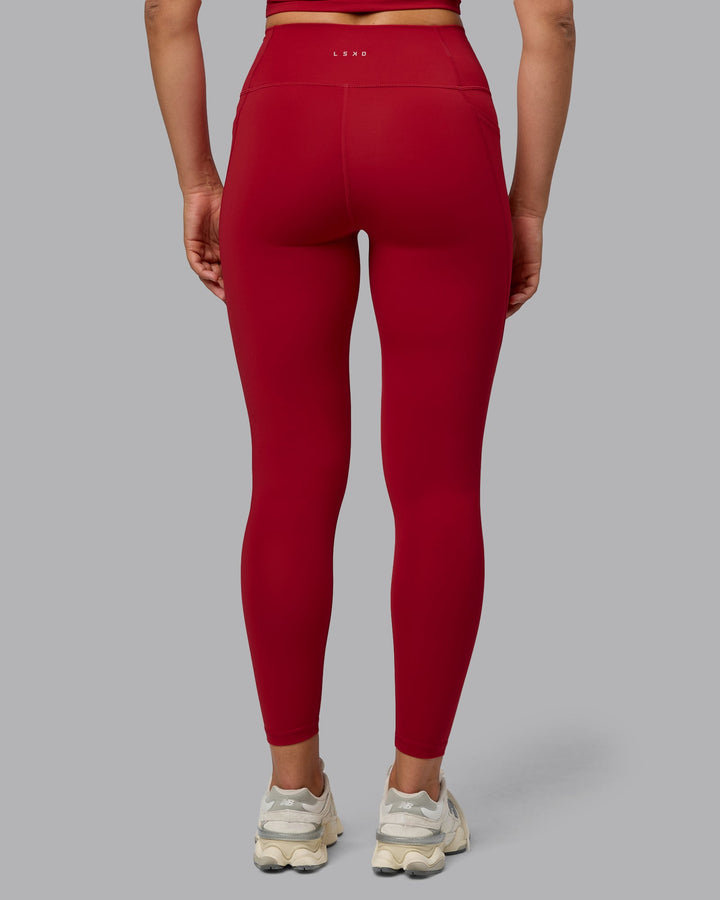 Woman wearing Fusion Full Length Tights with Pockets - Cherry Red
