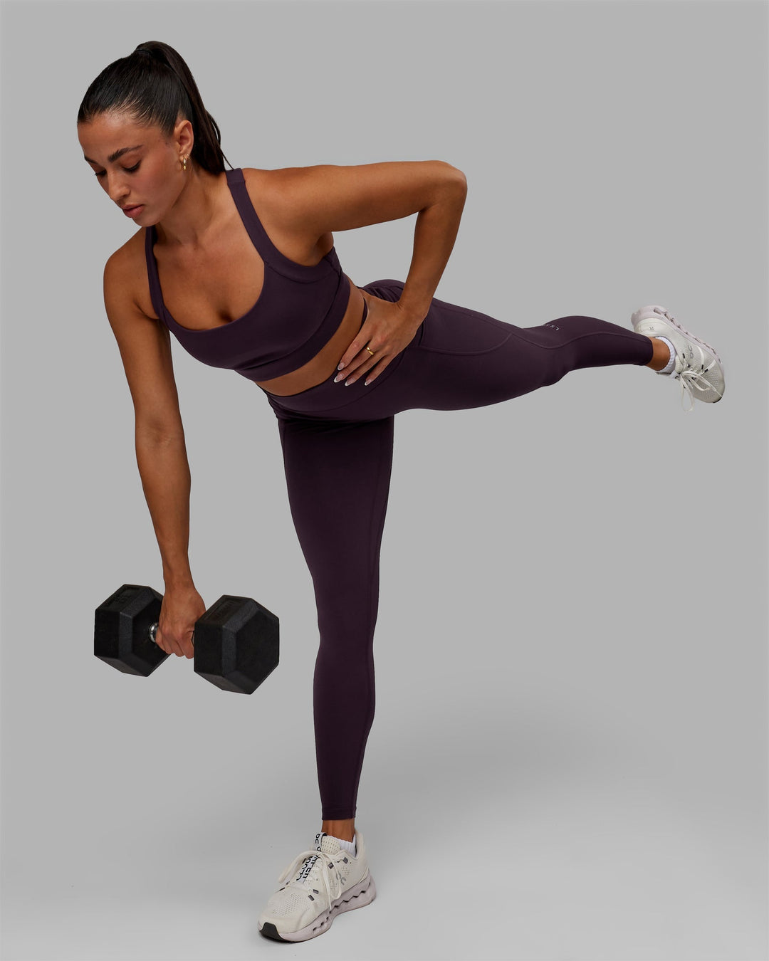 Woman wearing Fusion Ultra High-Rise Full Length Legging Pockets - Midnight Plum | Model:Gabby | Size:S
