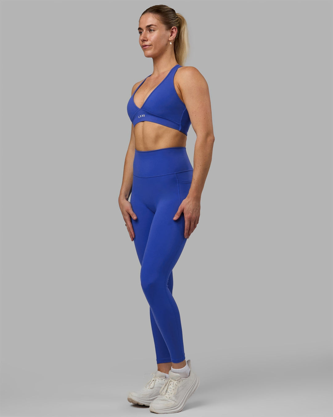 Woman wearing Fusion Full Length Leggings - Power Cobalt