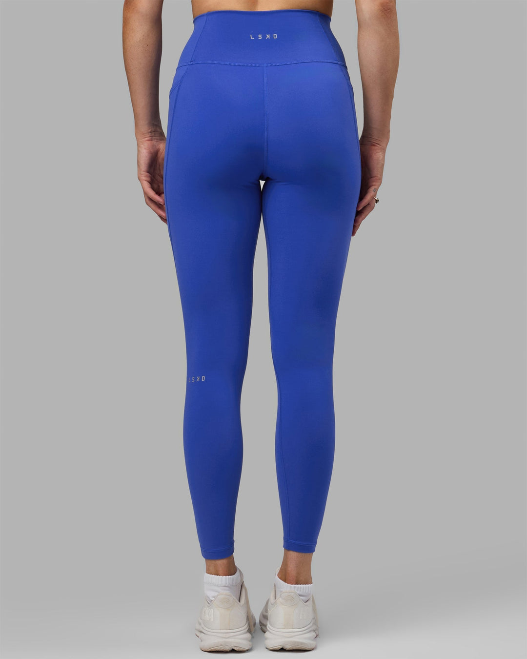 Woman wearing Fusion Full Length Leggings - Power Cobalt