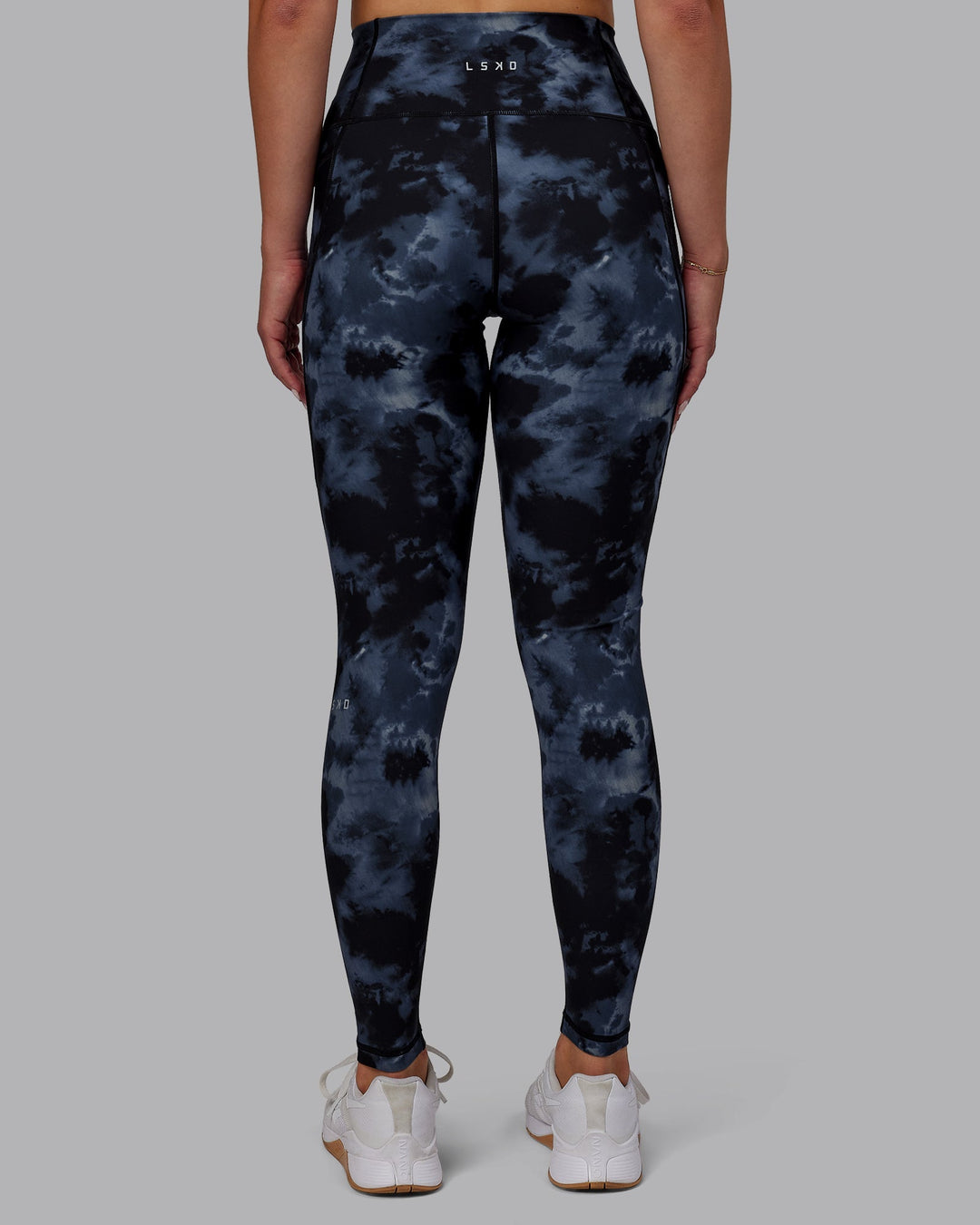 Woman wearing Fusion Full Length Leggings - Tie Dye-Midnight