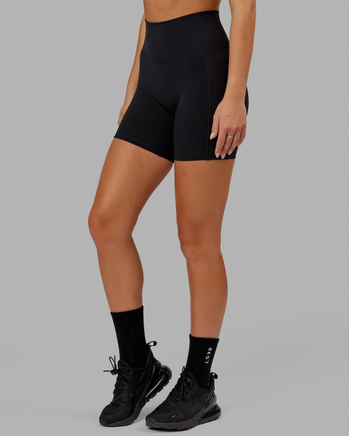 Woman wearing Fusion Mid Short Tight - Black