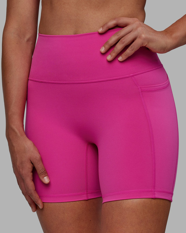 Woman wearing Fusion Mid-Length Shorts - Fuchsia Pink
