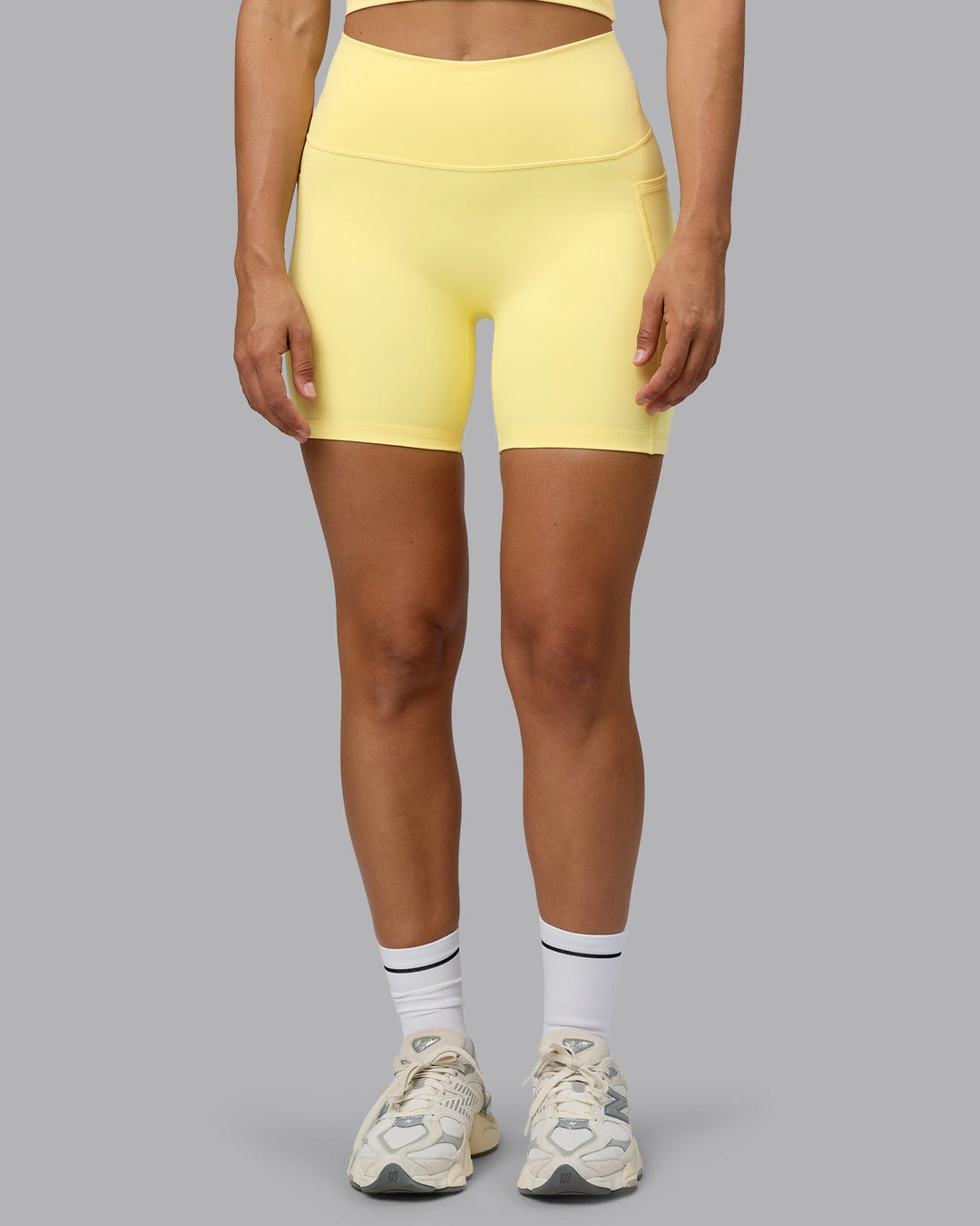 Woman wearing Fusion Mid Short Tights with Pockets - Lemon