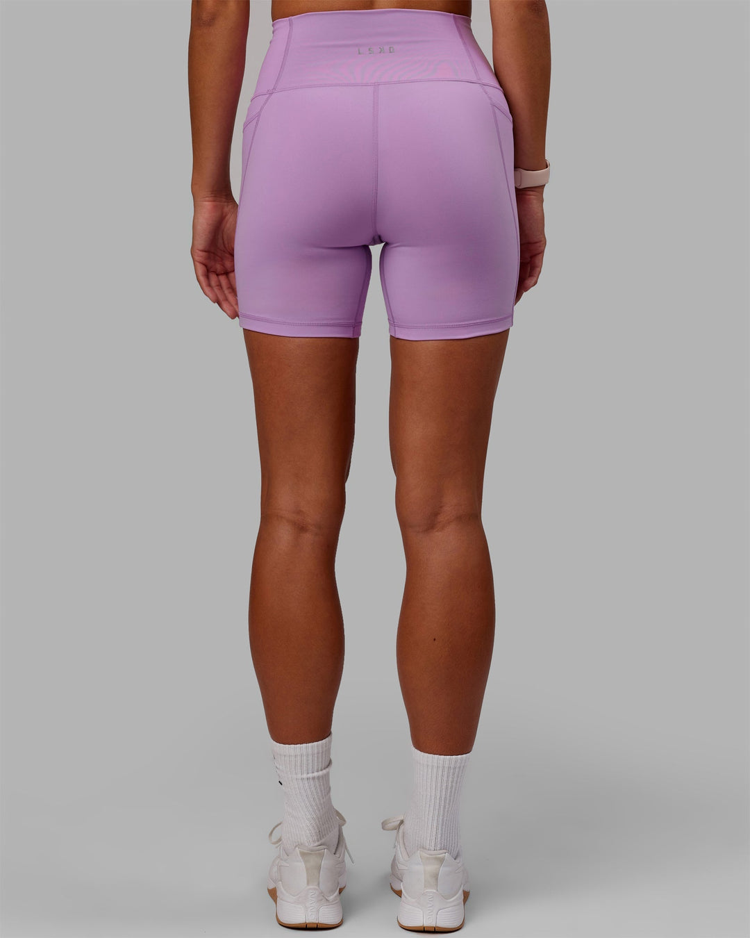 Woman wearing Fusion Mid-Length Shorts - Light Violet