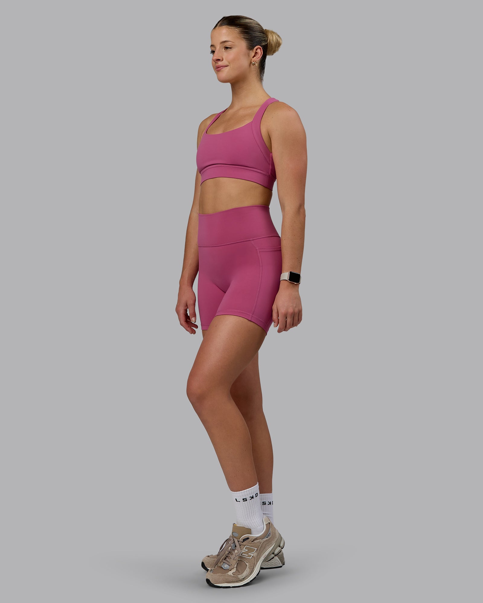 Woman wearing Fusion Ultra High-Rise 6" Short Pockets - Mauve Haze | Model:Chloe | Size:XS
