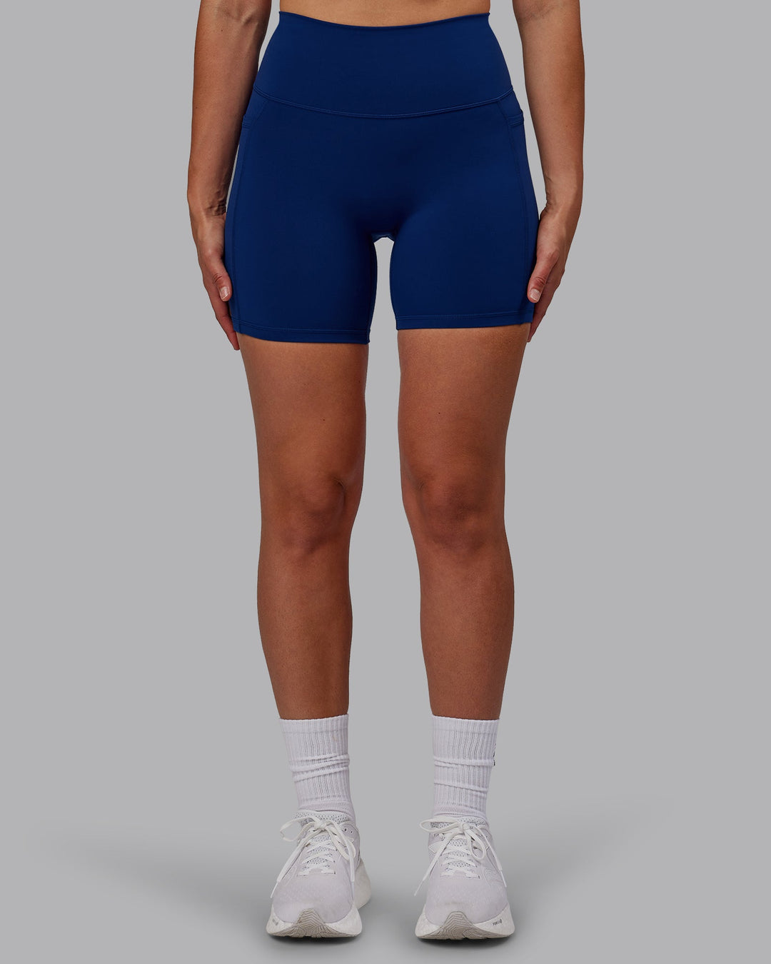 Woman wearing Fusion Mid-Length Shorts - Midnight Blue