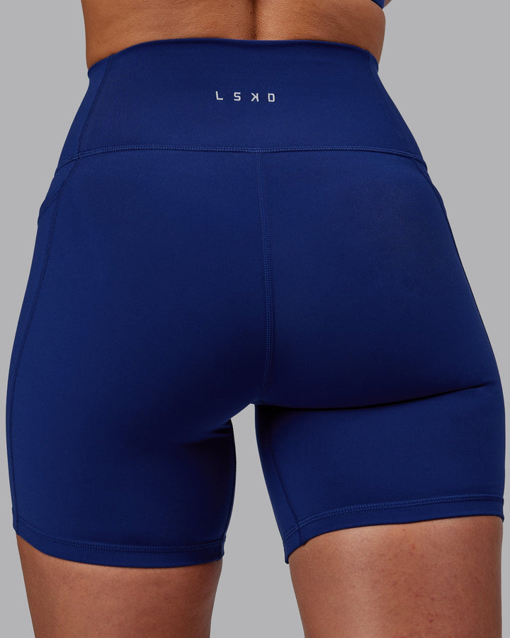 Woman wearing Fusion Mid-Length Shorts - Midnight Blue
